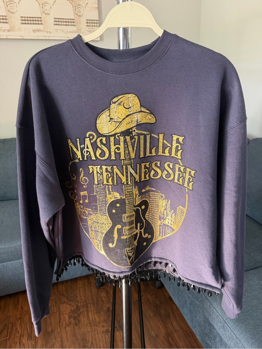 Goodie Two Sleeves Black Sweatshirt with Gold Graphic Detail